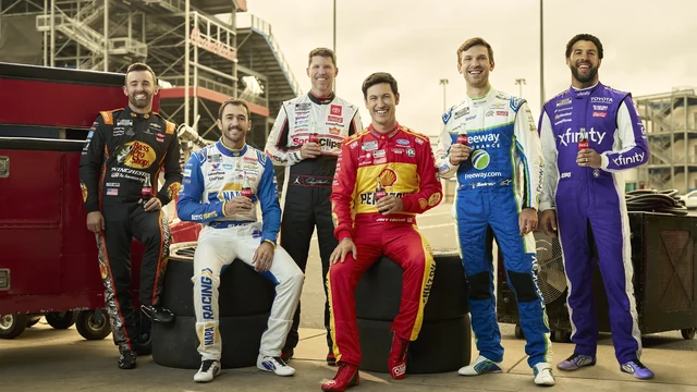 Coca-Cola racing drivers at a track for the Daytona 500 flyaway sweepstakes