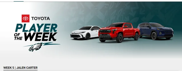 Philadelphia Eagles site banner reading "Toyota Player of the Week" next to three Toyota vehicles.