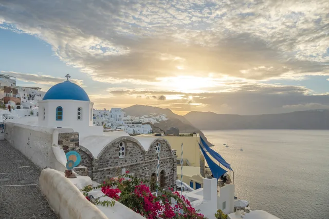 Whitewashed buildings and the sea at Santorini, Greece.