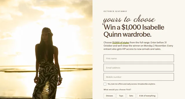 Isabelle Quinn October giveaway page showing a model in a printed dress at sunset and the text Win a $1,000 Isabelle Quinn wardrobe.