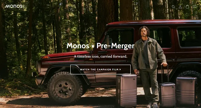 Monos and Pre-Merger campaign image showing a restored dark red Mercedes-Benz G-Class in a forest with a person standing beside Monos suitcases.