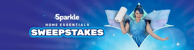 Sparkle Home Essentials Sweepstakes banner showing a person in a blue winged costume holding a roll of Sparkle paper towels.